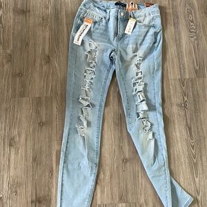 Light blue distressed ankle skinny Jean size 11